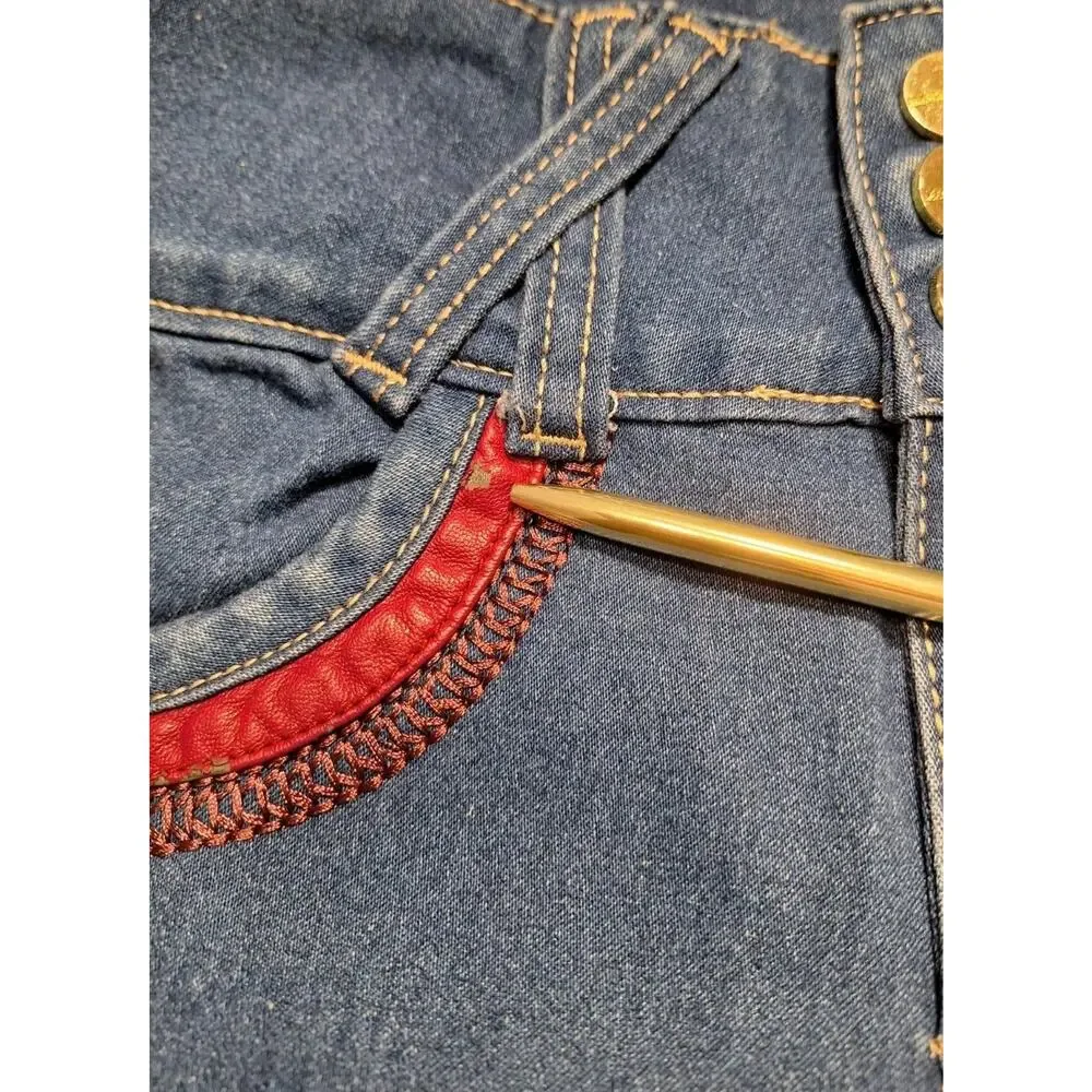 Paparazzi denim Jeans a triple-button high waist and distinctive red Trim